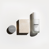 Zindeo 3-step starter set for anti-odorant, featuring a circular tin, a rectangular bar of soap, and a clear roll-on bottle labeled 'Zindeo Anti-odorant roll-on 50ml.' The products are arranged on a light background.